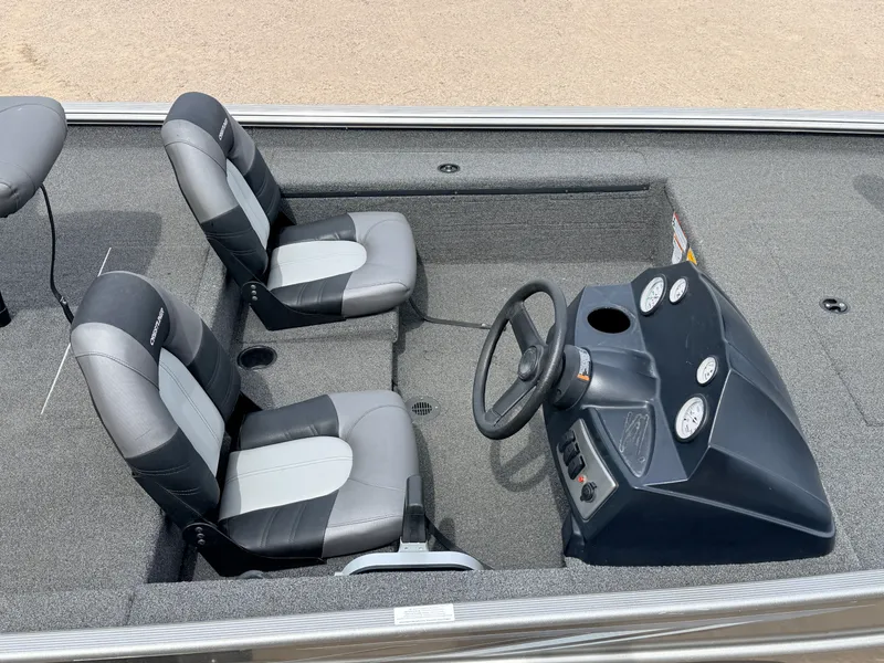 Slide: The Image of Interior view of a 2021 Crestliner 1700 Ridge boat with steering console. - 20