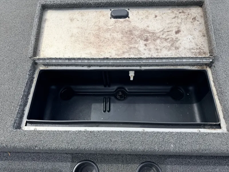 Slide: The Image of Open storage compartment in 2021 Crestliner 1700 Ridge boat. - 31