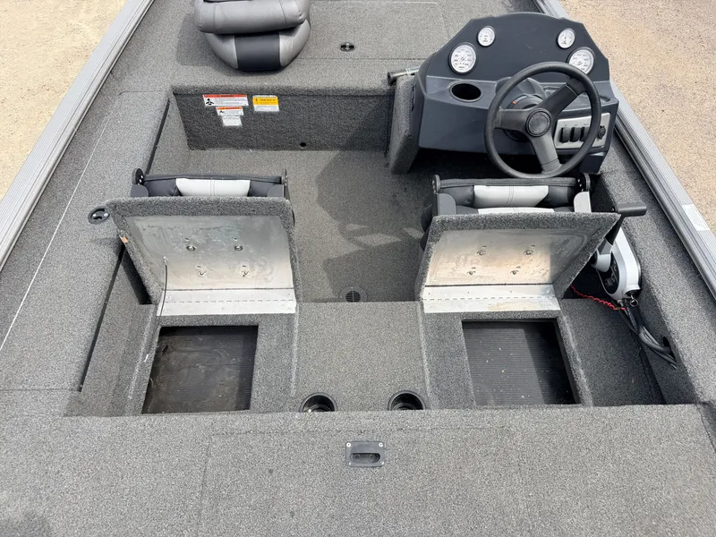 Slide: The Image of Interior of a 2021 Crestliner 1700 Ridge boat with steering console. - 37