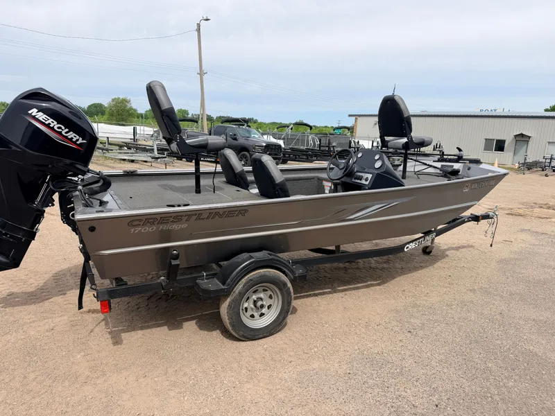 Slide: The Image of 2021 Crestliner 1700 Ridge boat with 40HP Mercury engine. - 48
