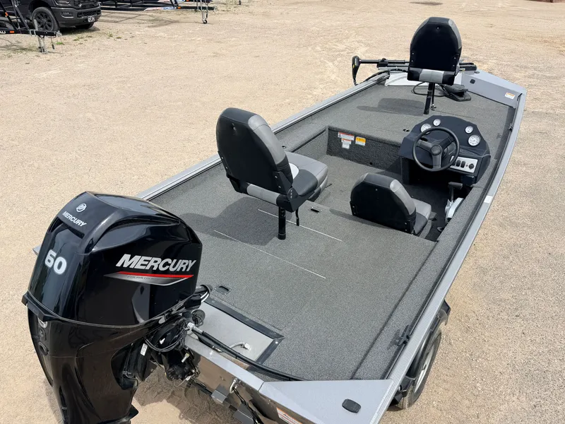 Slide: The Image of Crestliner 1700 Ridge boat with 60HP Mercury engine, 2021 model, on dry ground. - 7