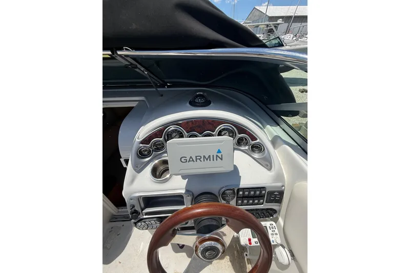 Slide: The Image of 2011 Crownline 236 SC boat dashboard with Garmin navigation system. - 25