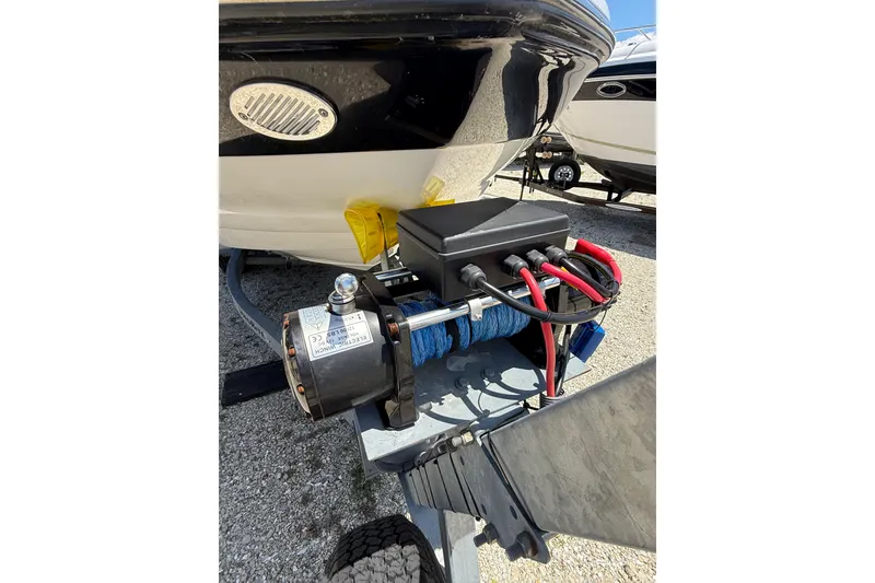 Slide: The Image of 2011 Crownline 236 SC boat trailer with electric winch and cables. - 6