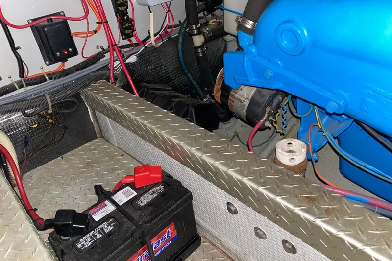Slide: The Image of Engine room of 1990 Luhrs 3400 Motor Yacht with battery and wiring. - 38