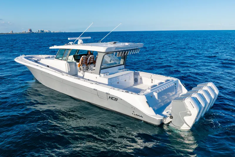 The Image of 2027 HCB 56 Suenos luxury boat cruising on open ocean waters. - 0