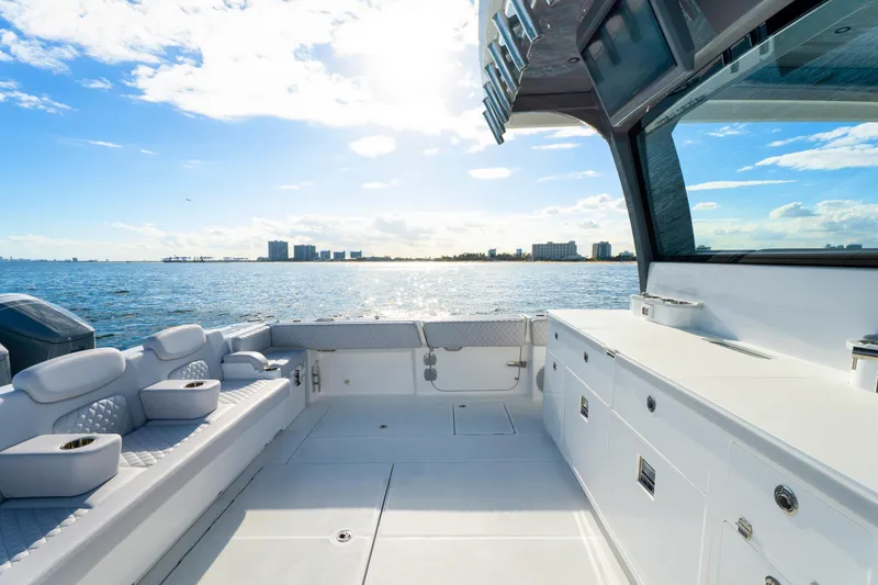 Slide: The Image of Luxurious 2027 HCB 56 Suenos yacht interior with ocean view and modern amenities. - 12