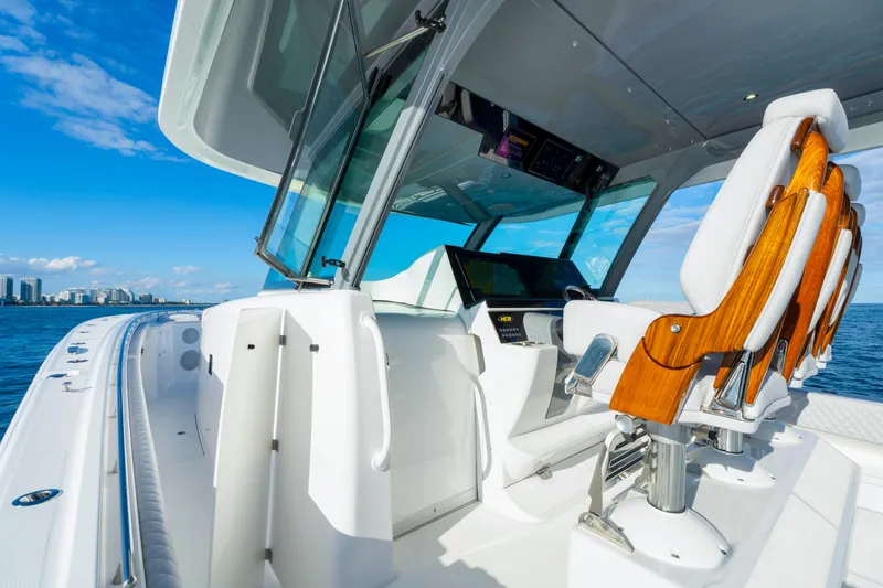 Slide: The Image of Luxury HCB 56 Suenos boat interior, 2027 model, featuring sleek design and advanced navigation systems. - 40