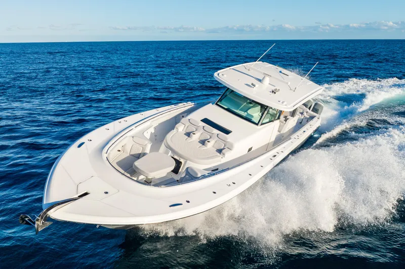 Slide: The Image of 2027 HCB 56 Suenos luxury yacht cruising on open ocean waters. - 50