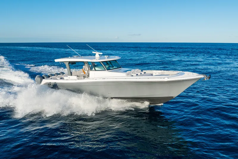 Slide: The Image of 2027 HCB 56 Suenos luxury yacht cruising on open ocean waters. - 52