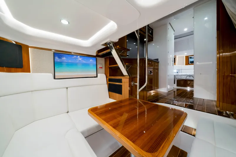 Slide: The Image of Luxurious interior of 2027 HCB 56 Suenos yacht with elegant seating and modern amenities. - 66