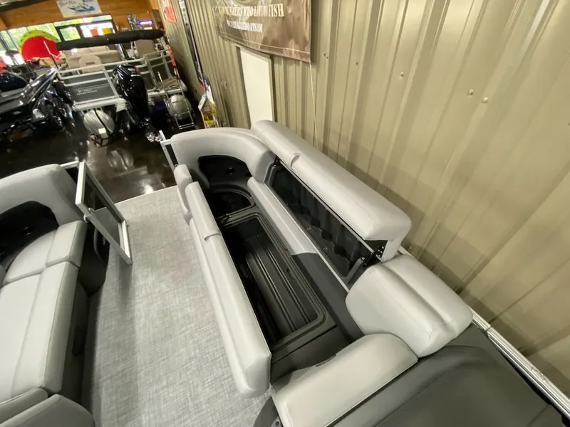 Slide: The Image of Interior of 2026 Sun Tracker Party Barge 20 DLX with gray seating. - 5
