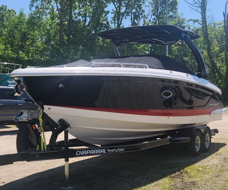 The Image of 2017 Chaparral 287 SSX boat on trailer outdoors. - 0