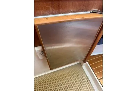 Slide: The Image of 2003 Morgan/Catalina 381 CC interior with wooden and metal paneling. - 12