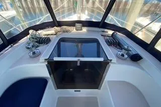 Slide: The Image of 2003 Morgan/Catalina 381 CC cockpit with ropes and navigation equipment. - 21