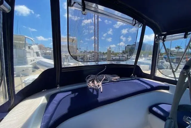 Slide: The Image of Interior view of 2003 Morgan/Catalina 381 CC sailboat with marina background. - 34