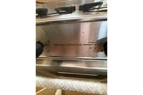 Slide: The Image of Close-up of a Hillerange stove control panel on a 2003 Morgan/Catalina 381 CC boat. - 9
