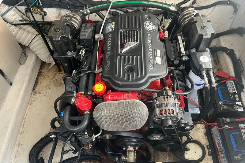Slide: The Image of Engine compartment of a 2007 Rinker 280 Express Cruiser with Volvo Penta engine. - 24