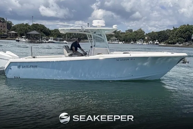 The Image of 2021 Sailfish 290 CC boat on water, featuring sleek design and modern amenities. - 0