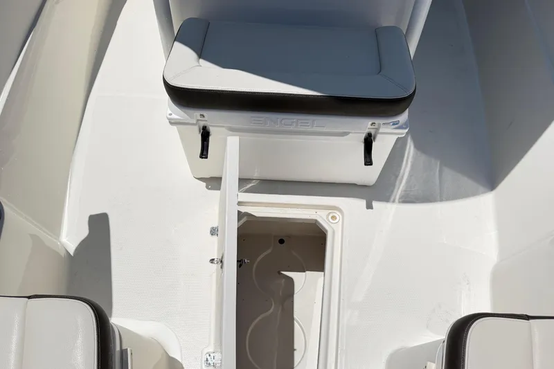 Slide: The Image of Interior of 2021 Sailfish 290 CC with storage and seating. - 25
