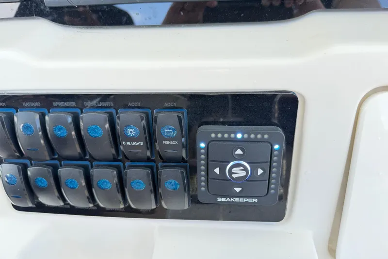 Slide: The Image of Control panel of a 2021 Sailfish 290 CC boat with Seakeeper system. - 27