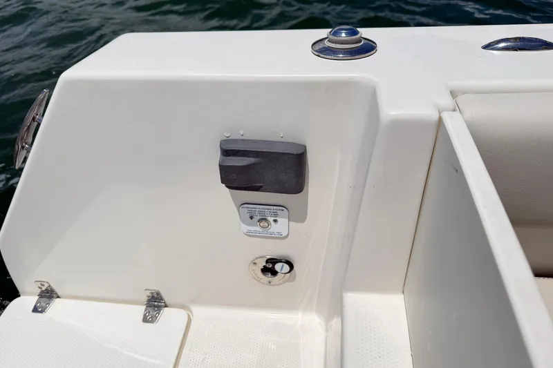 Slide: The Image of 2021 Sailfish 290 CC boat deck detail with flush mount and water view. - 41