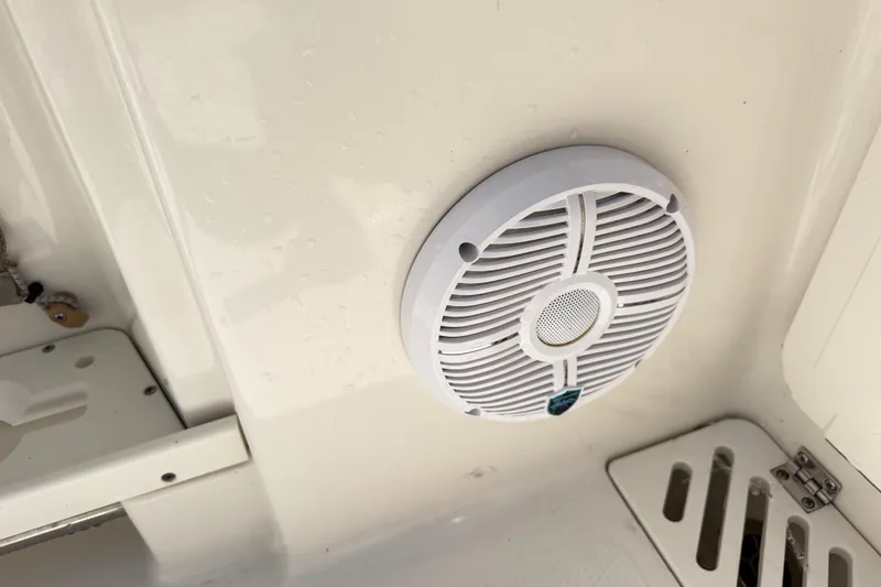 Slide: The Image of White speaker on 2021 Sailfish 290 CC boat interior. - 42