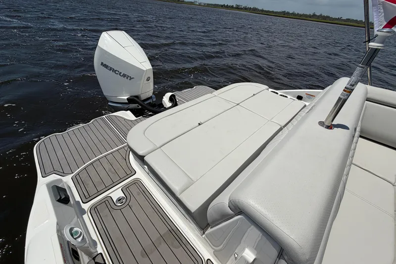 Slide: The Image of 2024 Sea Ray SDX 270 Outboard boat with Mercury engine on water. - 11