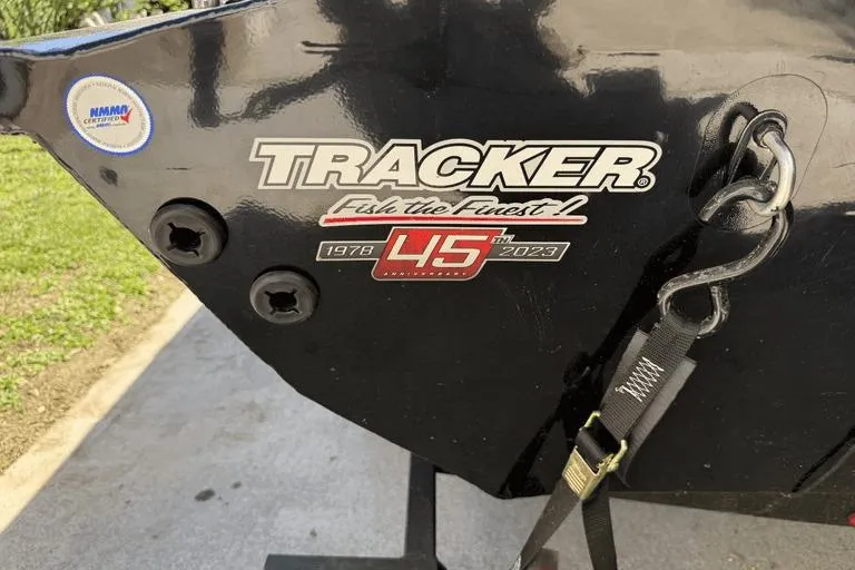 Slide: The Image of 2023 Tracker Pro Team 175 TX boat, celebrating 45th anniversary, with logo and strap detail. - 3