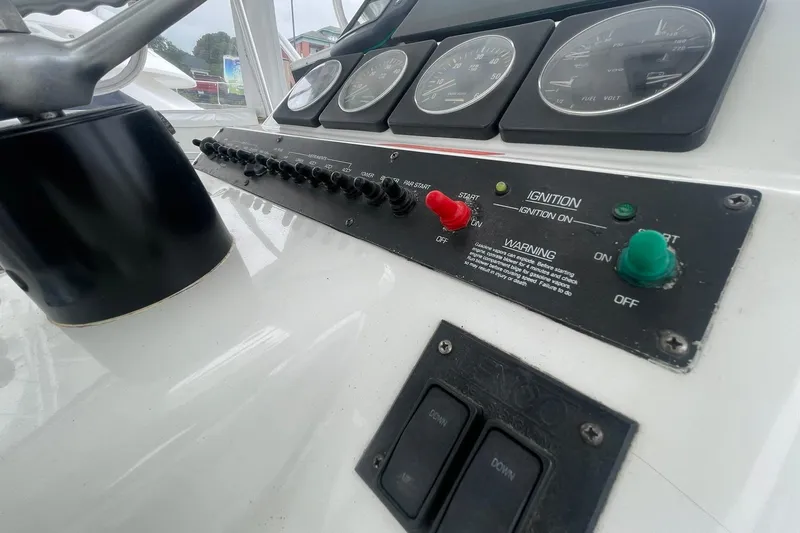 Slide: The Image of Control panel of a 1996 Luhrs Tournament 290 Open boat with gauges and switches. - 38