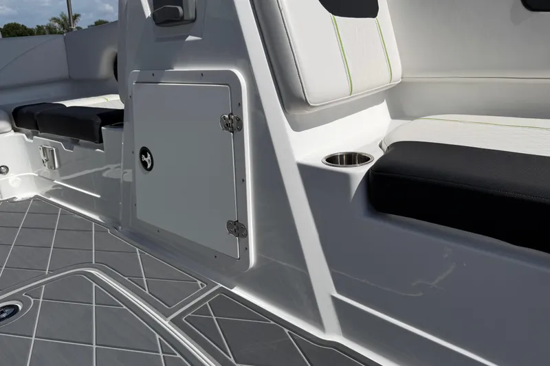 Slide: The Image of Interior of a 2021 Tahoe 1950 boat, featuring seating and storage compartment. - 73