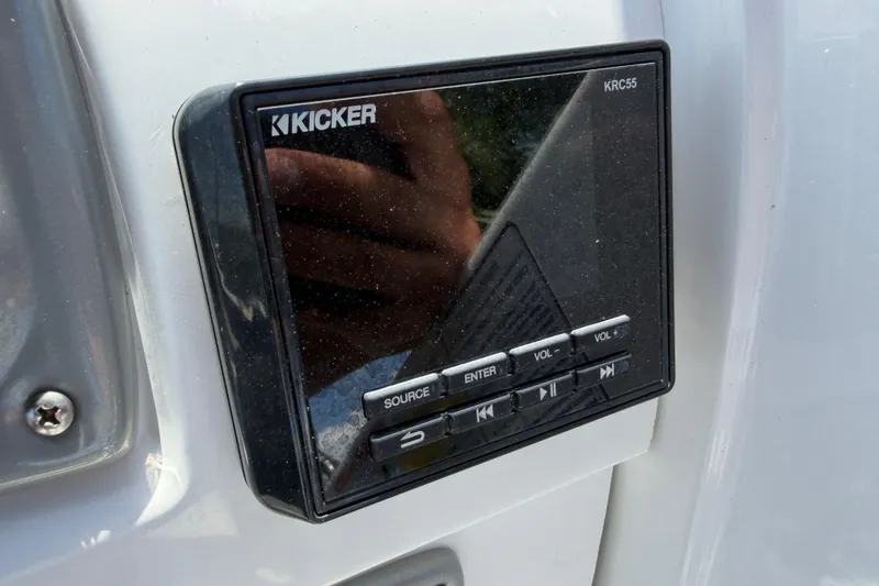 Slide: The Image of Kicker KRC55 audio control panel on 2021 Tahoe 1950 boat. - 43