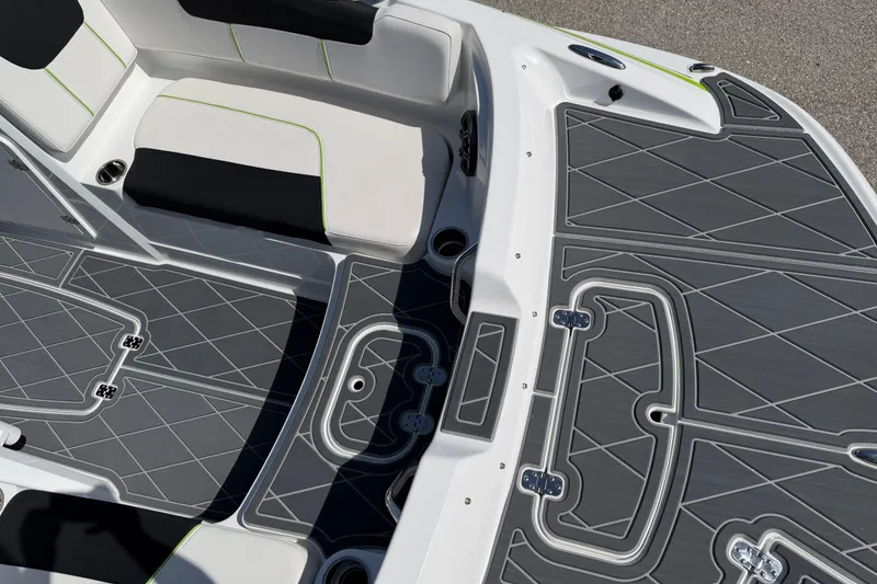 Slide: The Image of Modern 2021 Tahoe 1950 boat interior with sleek gray flooring and comfortable seating. - 66