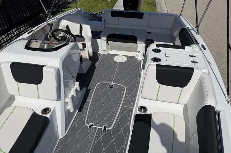 Slide: The Image of Modern 2021 Tahoe 1950 boat interior with sleek seating and steering console. - 71