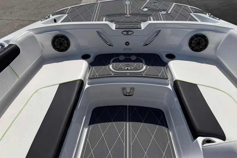 Slide: The Image of Interior of a 2021 Tahoe 1950 boat featuring sleek seating and modern design elements. - 56