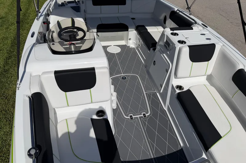 Slide: The Image of Interior of a 2021 Tahoe 1950 boat with modern seating and sleek design. - 67
