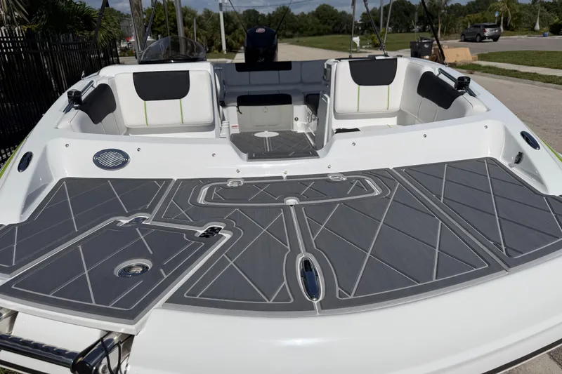 Slide: The Image of Modern 2021 Tahoe 1950 boat with sleek seating and stylish deck design. - 24