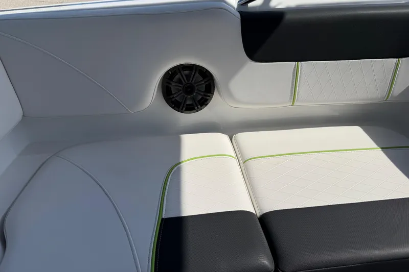 Slide: The Image of Interior seating of a 2021 Tahoe 1950 boat with speaker and stylish upholstery. - 91