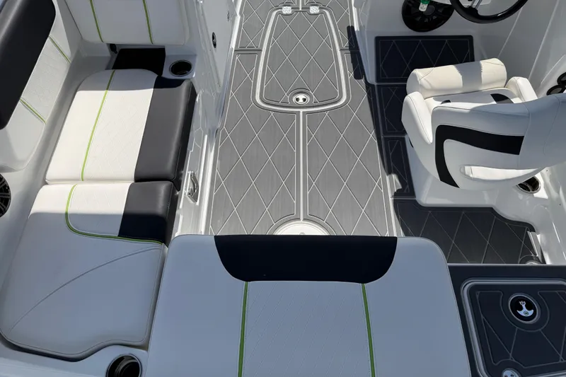 Slide: The Image of Interior of a 2021 Tahoe 1950 boat with stylish seating and modern flooring. - 38
