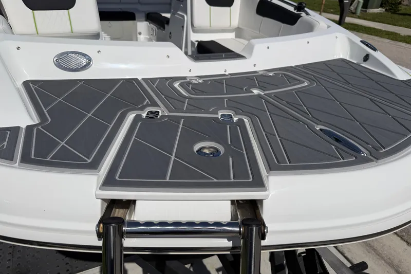 Slide: The Image of Rear deck of a 2021 Tahoe 1950 boat with gray non-slip surface. - 23
