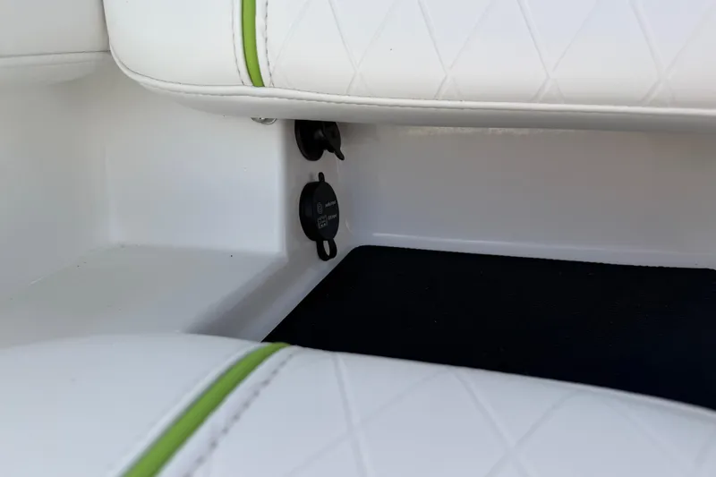 Slide: The Image of White and green interior detail of a 2021 Tahoe 1950 boat. - 89