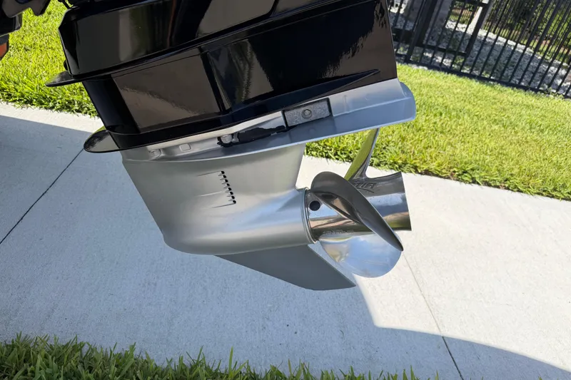 Slide: The Image of Close-up of a Tahoe 1950 boat motor propeller, 2021 model, on a sunny day. - 9