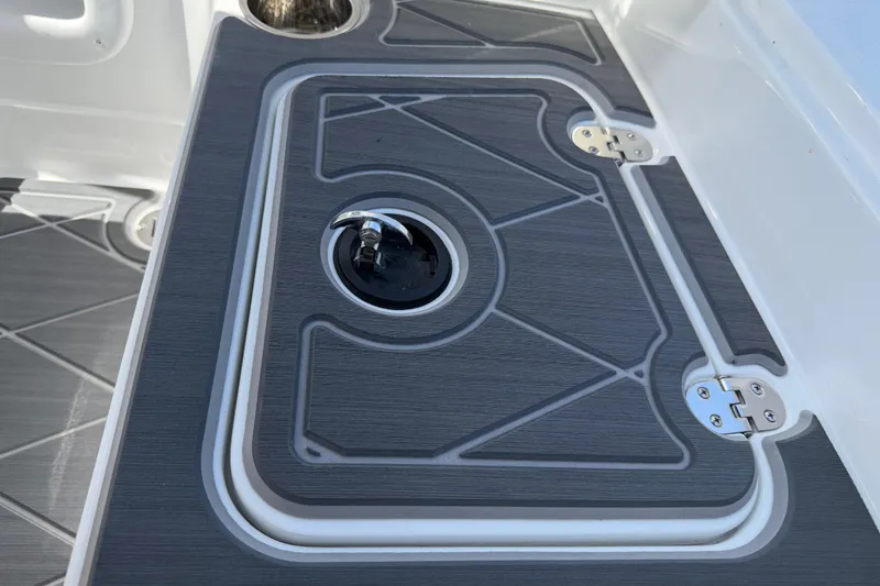Slide: The Image of Boat deck hatch with sleek design on a 2021 Tahoe 1950 model. - 85