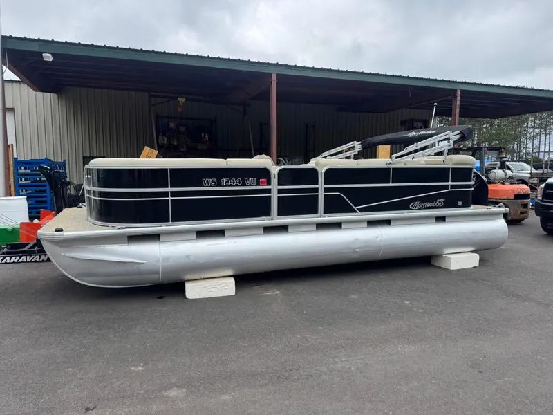 The Image of 2019 Misty Harbor A2285CR Adventure pontoon boat on parking lot. - 1