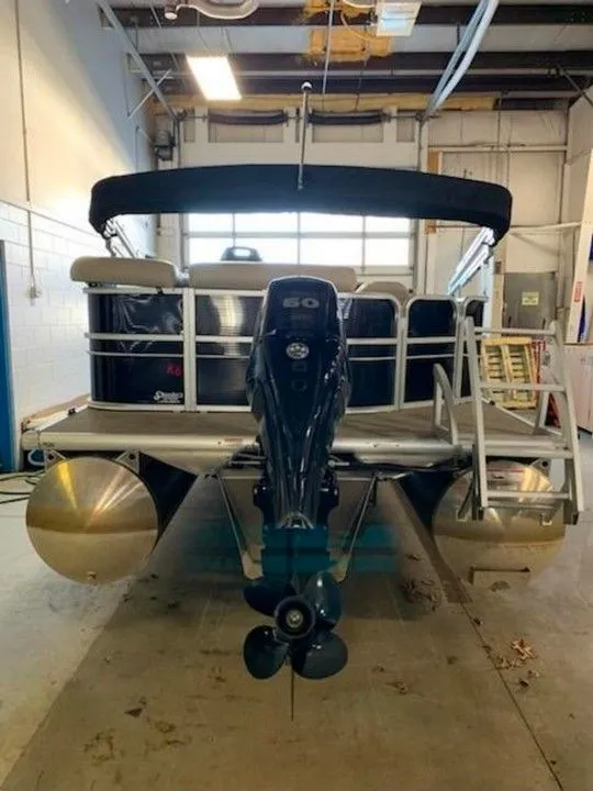 Slide: The Image of 2019 Misty Harbor A2285CR Adventure pontoon boat indoors. - 11
