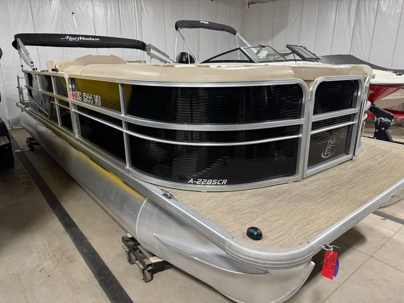 Slide: The Image of 2019 Misty Harbor A2285CR Adventure pontoon boat in storage facility. - 4