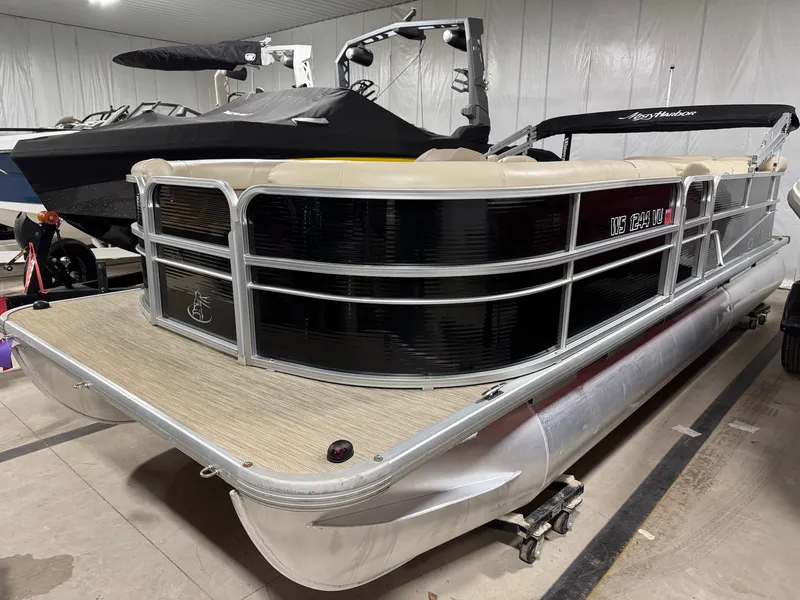 Slide: The Image of 2019 Misty Harbor A2285CR Adventure pontoon boat in storage facility. - 5