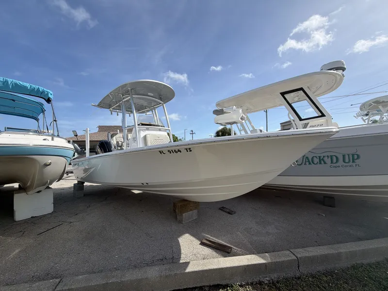 The Image of 2024 Sportsman Masters 227 Bay Boat on a parking lot. - 1