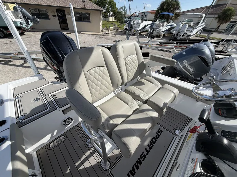 Slide: The Image of 2024 Sportsman Masters 227 Bay Boat with luxurious seating and Yamaha engines. - 14