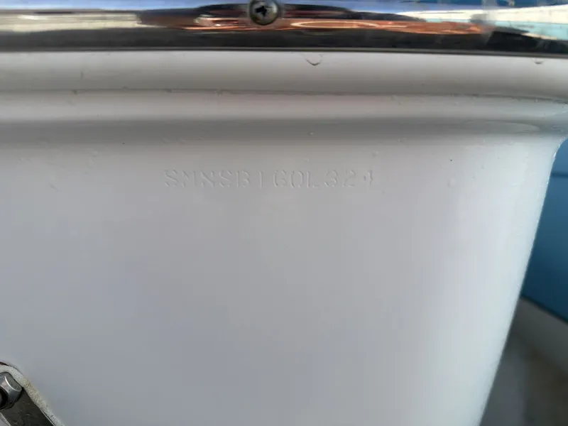 Slide: The Image of Close-up of serial number on a 2024 Sportsman Masters 227 Bay Boat. - 5