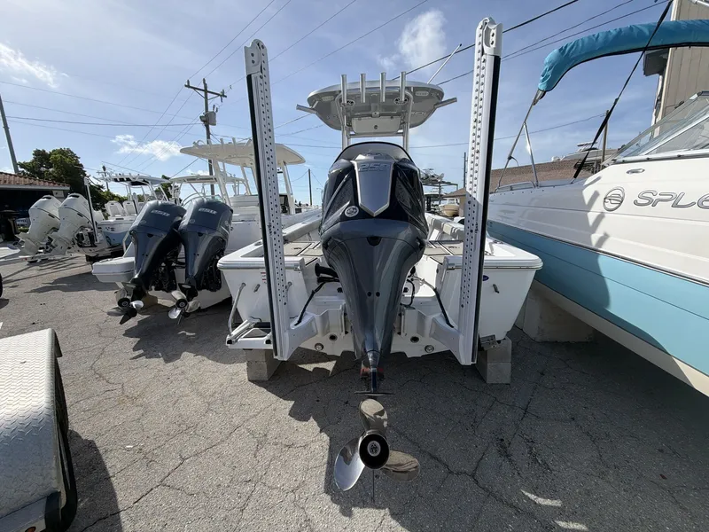 Slide: The Image of 2024 Sportsman Masters 227 Bay Boat with outboard motors. - 9